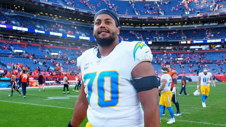 Oct 13, 2024; Denver, Colorado, USA; Los Angeles Chargers offensive tackle Rashawn Slater (70) following the win over the Denver Broncos at Empower Field at Mile High. Mandatory Credit: Ron Chenoy-Imagn Images