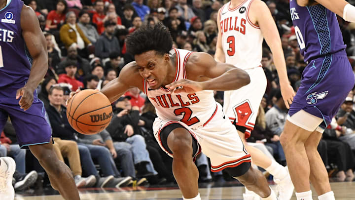 Feb 24, 2026; Chicago, Illinois, USA; Chicago Bulls guard Collin Sexton (2) looses the ball while dribbling past Charlotte Hornets guard Sion James (4) during the second half at United Center. Mandatory Credit: Matt Marton-Imagn Images Feb 24, 2026; Chicago, Illinois, USA; Chicago Bulls guard Collin Sexton (2) looses the ball while dribbling past Charlotte Hornets guard Sion James (4) during the second half at United Center. Mandatory Credit: Matt Marton-Imagn Images