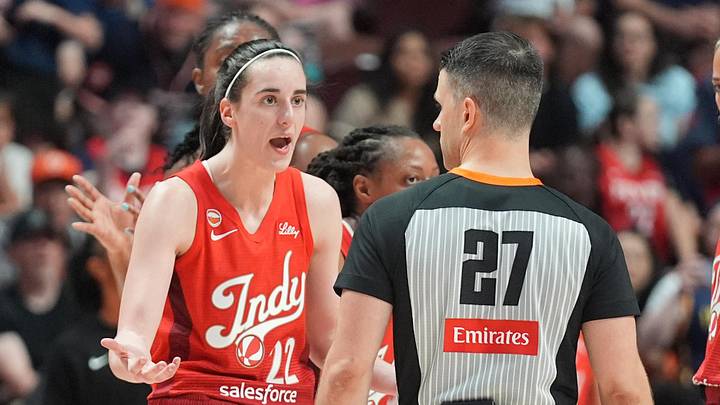 Indiana Fever guard Caitlin Clark (22) speaks with an official after being called for a technical foul Indiana Fever guard Caitlin Clark (22) speaks with an official after being called for a technical foul