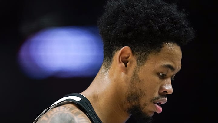Dec 6, 2024; Portland, Oregon, USA; Portland Trail Blazers shooting guard Anfernee Simons (1) reacts during the first half against the Utah Jazz at Moda Center. Mandatory Credit: Soobum Im-Imagn Images