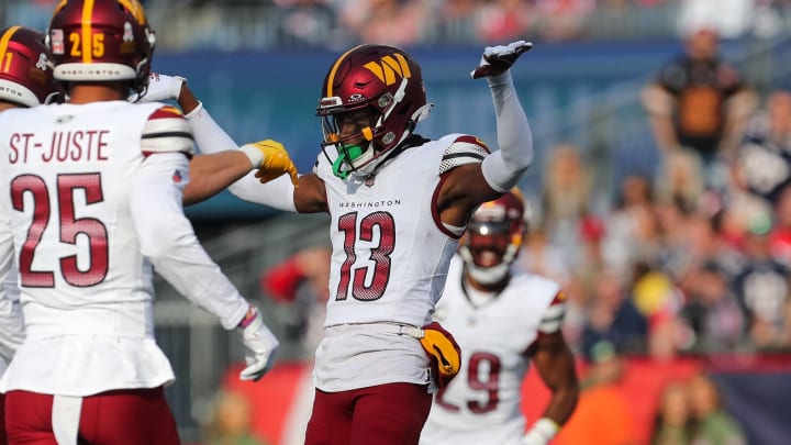 Nov 5, 2023; Foxborough, Massachusetts, USA; Washington Commanders cornerback Emmanuel Forbes (13) celebrates during the first half against the New England Patriots at Gillette Stadium. Mandatory Credit: Paul Rutherford-USA TODAY Sports Nov 5, 2023; Foxborough, Massachusetts, USA; Washington Commanders cornerback Emmanuel Forbes (13) celebrates during the first half against the New England Patriots at Gillette Stadium. Mandatory Credit: Paul Rutherford-USA TODAY Sports