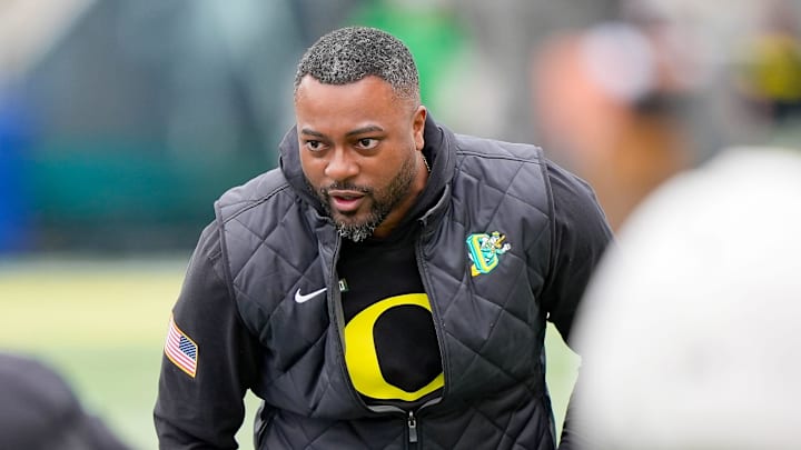 Oregon wide receivers coach Ross Douglas works with players during Oregon’s spring game on April 26, 2025, at Autzen Stadium in Eugene.