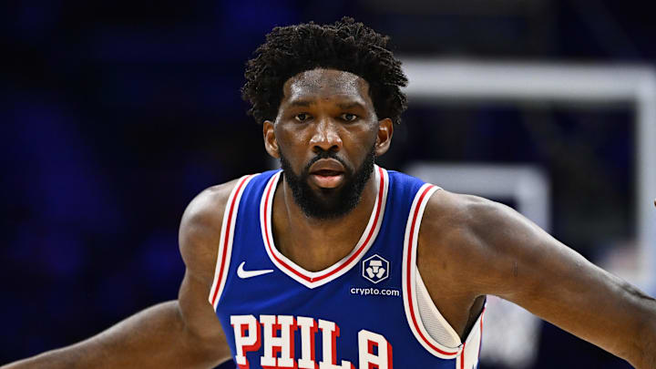 Nov 8, 2023; Philadelphia, Pennsylvania, USA; Philadelphia 76ers center Joel Embiid (21) drives against Boston Celtics guard Jrue Holiday (4) in the fourth quarter at Wells Fargo Center. Mandatory Credit: Kyle Ross-Imagn Images