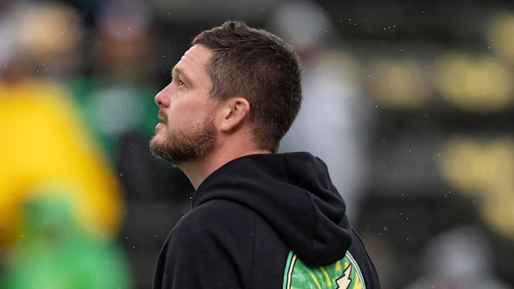 Oregon head coach Dan Lanning walks the field before the game as the Oregon Ducks host the Wisconsin Badgers on Oct. 25, 2025, at Autzen Stadium in Eugene, Oregon. Oregon head coach Dan Lanning walks the field before the game as the Oregon Ducks host the Wisconsin Badgers on Oct. 25, 2025, at Autzen Stadium in Eugene, Oregon.