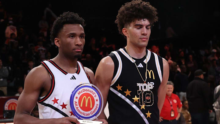 Apr 1, 2025; Brooklyn, NY, USA; McDonald's All American West guard Darryn Peterson (22) and McDonald's All American East forward Cameron Boozer (12) pose for photos after the game at Barclays Center. Mandatory Credit: Pamela Smith-Imagn Images