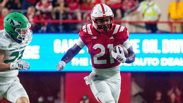 Nebraska running back Kwinten Ives carries the ball Saturday night against North Dakota. Nebraska running back Kwinten Ives carries the ball Saturday night against North Dakota.