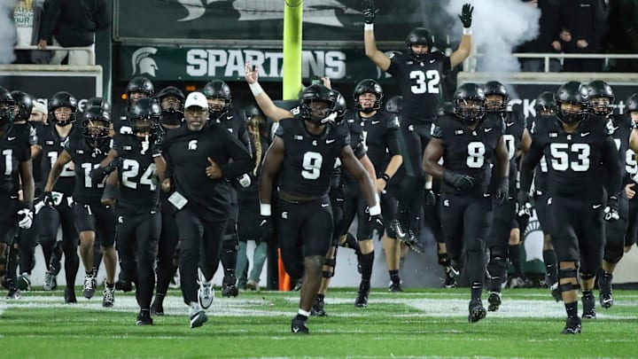 Michigan State Spartans interim head coach Harlon Barnett takes the field with his team before action against the Michigan Wolverines at Spartan Stadium in East Lansing on Saturday, Oct. 21, 2023.