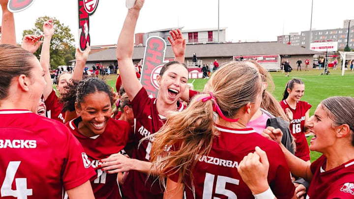 No. 6 Arkansas soccer players celebrate their SEC regular season championship after being Oklahoma 3-1 on Sunday.