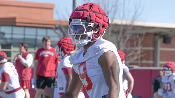 Arkansas Razorbacks wide receiver O'Mega Blake loosening up before a spring practice on the outdoor fields in Fayetteville, Ark.