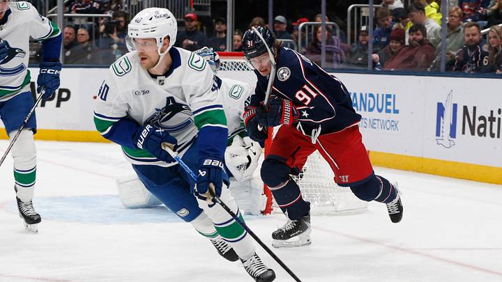 Elias Pettersson, Kent Johnson