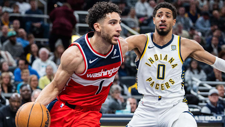Apr 8, 2025; Indianapolis, Indiana, USA; Washington Wizards guard Colby Jones (1) dribbles the ball while Indiana Pacers guard Tyrese Haliburton (0) defends in the second half at Gainbridge Fieldhouse. Mandatory Credit: Trevor Ruszkowski-Imagn Images Apr 8, 2025; Indianapolis, Indiana, USA; Washington Wizards guard Colby Jones (1) dribbles the ball while Indiana Pacers guard Tyrese Haliburton (0) defends in the second half at Gainbridge Fieldhouse. Mandatory Credit: Trevor Ruszkowski-Imagn Images