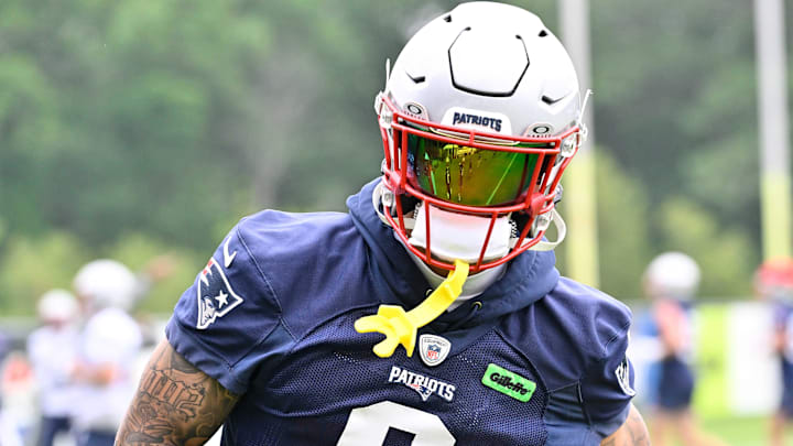 Jun 9, 2025; Foxborough, MA, USA; New England Patriots cornerback Christian Gonzalez (0) runs after the catch during minicamp at Gillette Stadium. Mandatory Credit: Eric Canha-Imagn Images