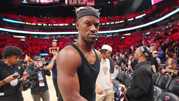 Jan 19, 2025; Miami, Florida, USA;  Miami Heat forward Jimmy Butler (22) walks off the court after greeting court-side friends following the victory over the San Antonio Spurs at Kaseya Center. Mandatory Credit: Jim Rassol-Imagn Images