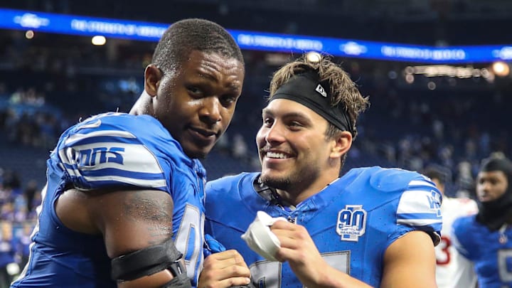 Detroit Lions linebacker Julian Okwara (99) shakes hands with linebacker Malcolm Rodriguez (44) Detroit Lions linebacker Julian Okwara (99) shakes hands with linebacker Malcolm Rodriguez (44)