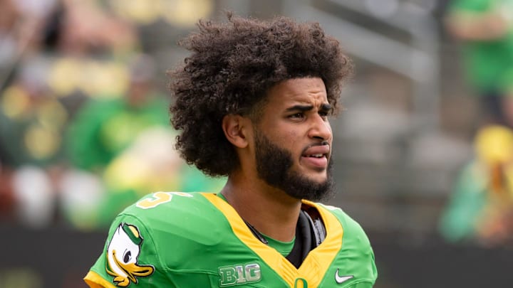 Oregon quarterback Dante Moore warms up as the Oregon Ducks host the Oklahoma State Cowboys on Sept. 6, 2025, at Autzen Stadium in Eugene, Oregon. Oregon quarterback Dante Moore warms up as the Oregon Ducks host the Oklahoma State Cowboys on Sept. 6, 2025, at Autzen Stadium in Eugene, Oregon.