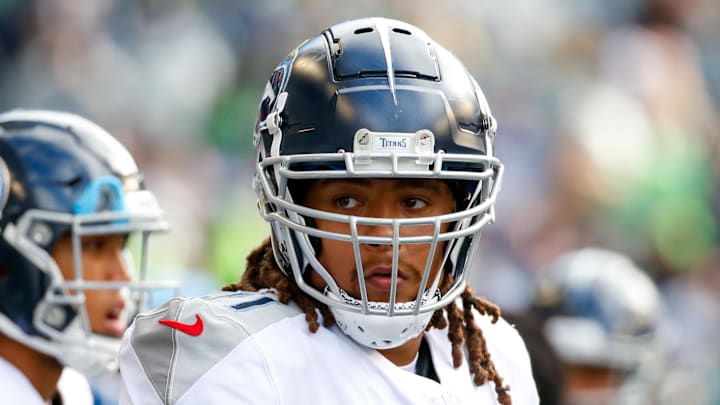 Former Tennessee Titans offensive tackle Kendall Lamm watches on the field.