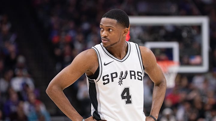 Mar 7, 2025; Sacramento, California, USA; San Antonio Spurs guard De'Aaron Fox (4) looks on during the first quarter of the game against the Sacramento Kings at Golden 1 Center.