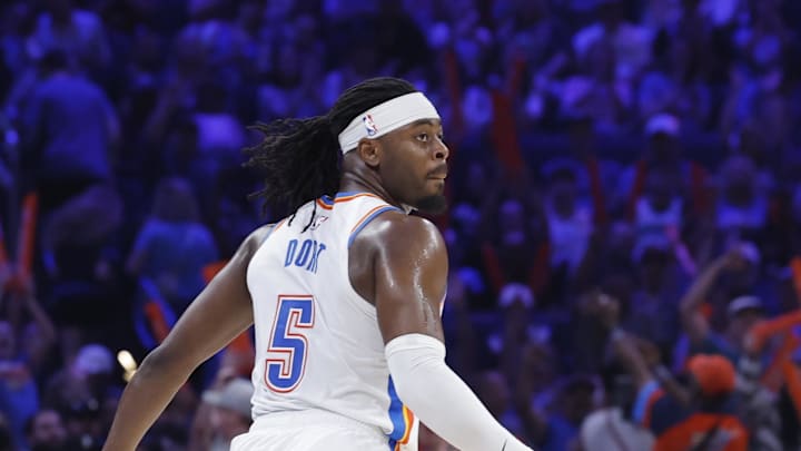 Mar 29, 2025; Oklahoma City, Oklahoma, USA; Oklahoma City Thunder guard Luguentz Dort (5) gestures after scoring a 3-point basket against the Indiana Pacers during the second quarter at Paycom Center. Mandatory Credit: Alonzo Adams-Imagn Images