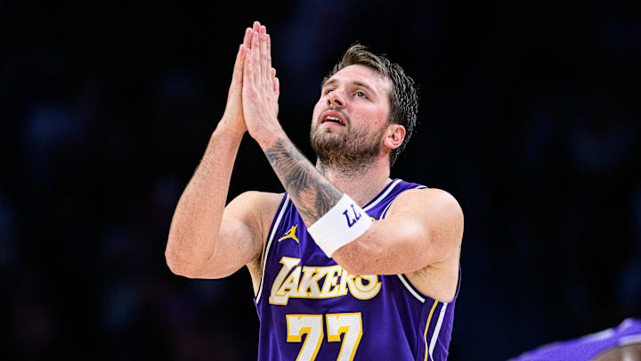 Mar 27, 2026; Los Angeles, California, USA; Los Angeles Lakers guard Luka Doncic (77) gestures during the second half against the Brooklyn Nets at Crypto.com Arena. Mandatory Credit: William Liang-Imagn Images