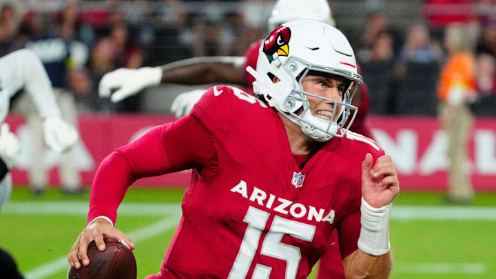 Cardinals quarterback Clayton Tune (15) scrambles against the Raiders during a preseason game at State Farm Stadium in Glendale on Aug. 23, 2025. Cardinals quarterback Clayton Tune (15) scrambles against the Raiders during a preseason game at State Farm Stadium in Glendale on Aug. 23, 2025.