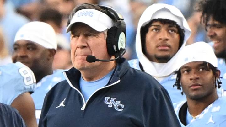 Nov 22, 2025; Chapel Hill, North Carolina, USA; North Carolina Tar Heels head coach Bill Belichick watches play during the first half against the Duke Blue Devils at Kenan Stadium. Mandatory Credit: William Howard-Imagn Images Nov 22, 2025; Chapel Hill, North Carolina, USA; North Carolina Tar Heels head coach Bill Belichick watches play during the first half against the Duke Blue Devils at Kenan Stadium. Mandatory Credit: William Howard-Imagn Images
