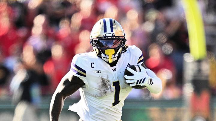 Oct 4, 2025; College Park, Maryland, USA;  Washington Huskies running back Jonah Coleman (1) carries the ball against the Maryland Terrapins at SECU Stadium.