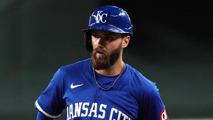 Jul 6, 2025; Phoenix, Arizona, USA; Kansas City Royals outfielder John Rave (26) hits an RBI single against the Arizona Diamondbacks in the fifth inning at Chase Field. Mandatory Credit: Rick Scuteri-Imagn Images
