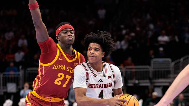 Mar 12, 2026; Kansas City, MO, USA; Texas Tech Red Raiders guard Christian Anderson (4) brings the ball up court around Iowa State Cyclones guard Killyan Toure (27) during the first half at T-Mobile Center. Mandatory Credit: William Purnell-Imagn Imagess