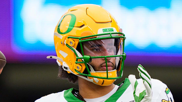 Oregon quarterback Dante Moore warms up as the Oregon Ducks take on the Washington Huskies on Nov. 29, 2025, at Husky Stadium in Seattle, Washington.