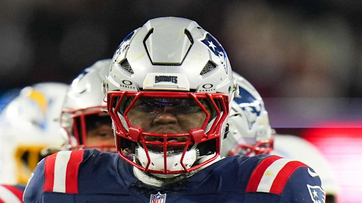 New England Patriots defensive end Milton Williams celebrates a sack.