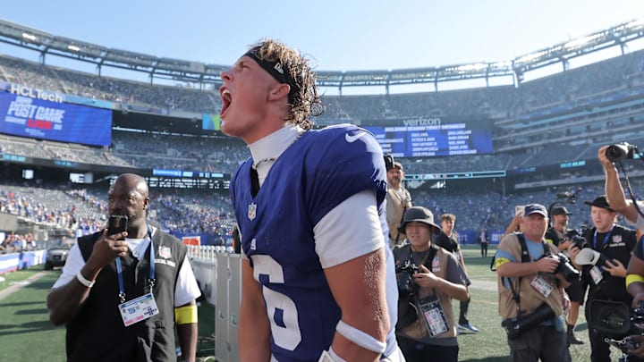 Sep 28, 2025; East Rutherford, New Jersey, USA; New York Giants quarterback Jaxson Dart (6) reacts after defeating the Los Angeles Chargers at MetLife Stadium. Mandatory Credit: Brad Penner-Imagn Images