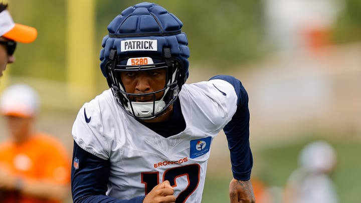 Jul 26, 2024; Englewood, CO, USA; Denver Broncos wide receiver Tim Patrick (12) during training camp at Broncos Park Powered by CommonSpirit. Jul 26, 2024; Englewood, CO, USA; Denver Broncos wide receiver Tim Patrick (12) during training camp at Broncos Park Powered by CommonSpirit.