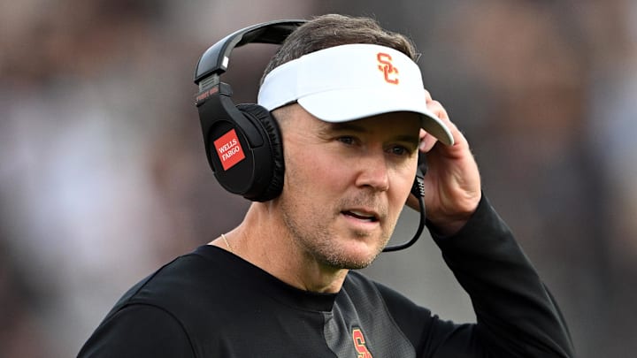 Sep 13, 2025; West Lafayette, Indiana, USA; Southern California Trojans head coach Lincoln Riley stands on the sidelines during the first quarter against the Purdue Boilermakers at Ross-Ade Stadium. Mandatory Credit: Marc Lebryk-Imagn Images