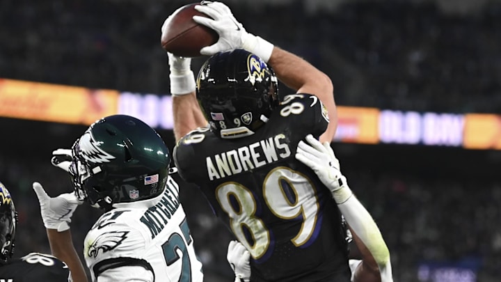 Dec 1, 2024; Baltimore, Maryland, USA;  Baltimore Ravens tight end Mark Andrews (89) catches s pass for a touchdown  against the Philadelphia Eagles during the first quarter at M&T Bank Stadium. Mandatory Credit: Tommy Gilligan-Imagn Images
