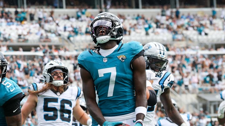 Sep 7, 2025; Jacksonville, Florida, USA; Jacksonville Jaguars wide receiver Brian Thomas Jr. (7) reacts after scoring on a 9-yard touchdown run against the Carolina Panthers during the first half at EverBank Stadium. Mandatory Credit: Nathan Ray Seebeck-Imagn Images