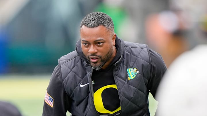 Oregon wide receivers coach Ross Douglas works with players during Oregon’s spring game on April 26, 2025, at Autzen Stadium in Eugene.