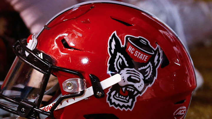 Nov 18, 2017; Winston-Salem, NC, USA; A North Carolina State Wolfpack helmet lays on the sidelines during the game against the Wake Forest Demon Deacons at BB&T Field. Mandatory Credit: Jeremy Brevard-Imagn Images Nov 18, 2017; Winston-Salem, NC, USA; A North Carolina State Wolfpack helmet lays on the sidelines during the game against the Wake Forest Demon Deacons at BB&T Field. Mandatory Credit: Jeremy Brevard-Imagn Images