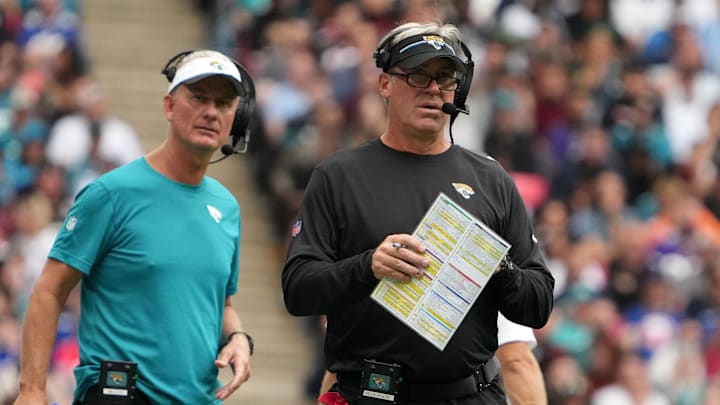 Oct 1, 2023; London, United Kingdom; Jacksonville Jaguars coach Doug Pederson (right) and quarterbacks coach Mike McCoy watch from the sidelines against the Atlanta Falcons in the first half during an NFL International Series game at Wembley Stadium. Mandatory Credit: Kirby Lee-Imagn Images