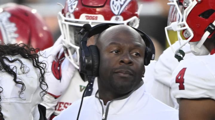 Nov 30, 2024; Pasadena, California, USA; Fresno State Bulldogs head coach Tim Skipper talks to his players during a timeout in the fourth quarter against the UCLA Bruins at Rose Bowl. Mandatory Credit: Robert Hanashiro-Imagn Images