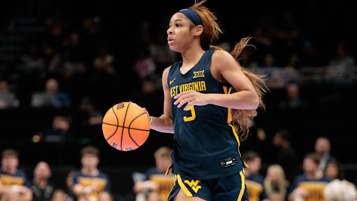 Mar 8, 2026; Kansas City, MO, USA; West Virginia Mountaineers guard Gia Cooke (3) brings the ball up court during the first half against the TCU Horned Frogs at T-Mobile Center. Mandatory Credit: William Purnell-Imagn Images