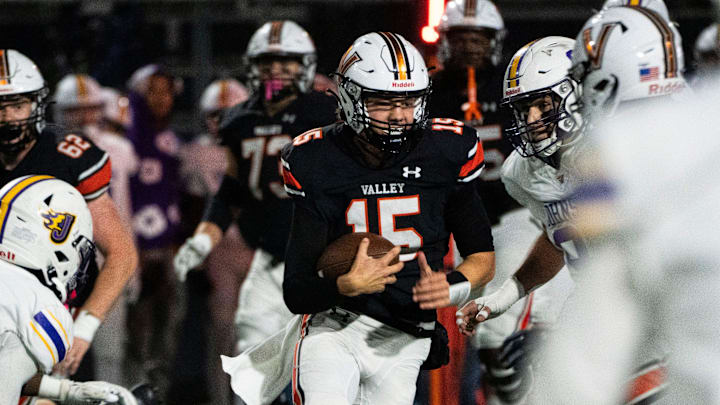 Valley's Drake DeGroote runs the ball during a playoff quarterfinal game at Valley Stadium on Friday, Nov. 8, 2024, in West Des Moines. Valley's Drake DeGroote runs the ball during a playoff quarterfinal game at Valley Stadium on Friday, Nov. 8, 2024, in West Des Moines.