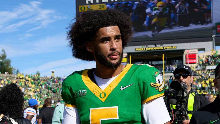 Sep 5, 2026; Eugene, Oregon, USA; Oregon Ducks quarterback Dante Moore (5) walks off the field after a game against the Boise State Broncos at Autzen Stadium Sep 5, 2026; Eugene, Oregon, USA; Oregon Ducks quarterback Dante Moore (5) walks off the field after a game against the Boise State Broncos at Autzen Stadium