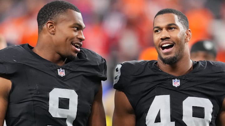 Dec 7, 2025; Paradise, Nevada, USA;  Las Vegas Raiders defensive end Tyree Wilson (9) and defensive end Charles Snowden (49) leave the field following a game against the Denver Broncos at Allegiant Stadium. Mandatory Credit: Stephen R. Sylvanie-Imagn Images
