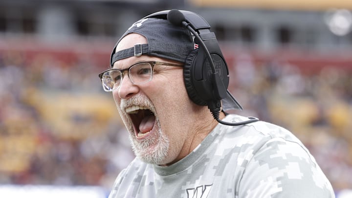Nov 10, 2024; Landover, Maryland, USA; Washington Commanders head coach Dan Quinn celebrates on the sidelines after an interception pass against the Pittsburgh Steelers during the second half at Northwest Stadium. Mandatory Credit: Amber Searls-Imagn Images Nov 10, 2024; Landover, Maryland, USA; Washington Commanders head coach Dan Quinn celebrates on the sidelines after an interception pass against the Pittsburgh Steelers during the second half at Northwest Stadium. Mandatory Credit: Amber Searls-Imagn Images