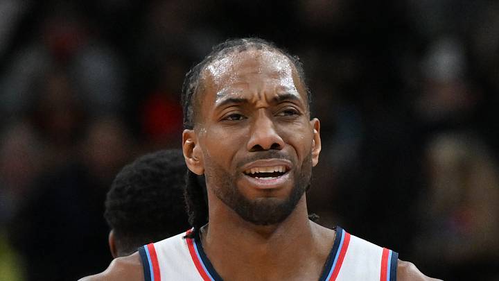 Los Angeles Clippers forward Kawhi Leonard walks off the floor after time out was called.