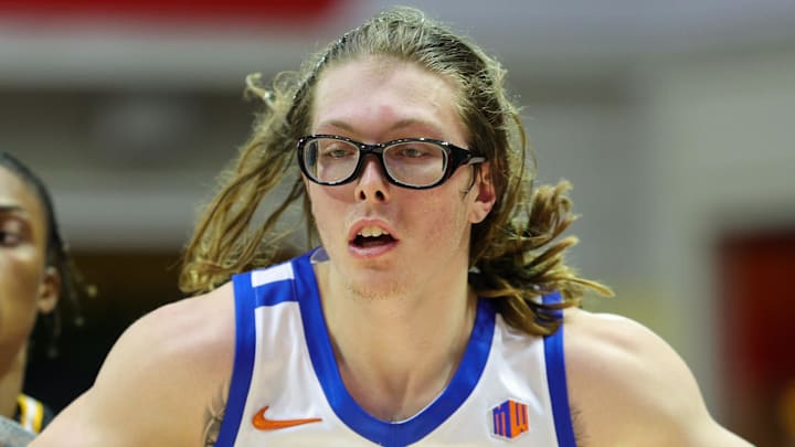 Nov 24, 2023; Kissimmee, FL, USA;  Boise State Broncos forward Andrew Meadow (13) drives to the hoop past Virginia Commonwealth Rams forward Toibu Lawal (10) in the second half during the ESPN Events Invitational Consolation game 2 at State Farm Field House. Mandatory Credit: Nathan Ray Seebeck-Imagn Images