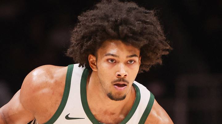 Milwaukee Bucks center Jericho Sims (00) handles the ball against the Atlanta Hawks in the second quarter at State Farm Arena on March 14, 2026.