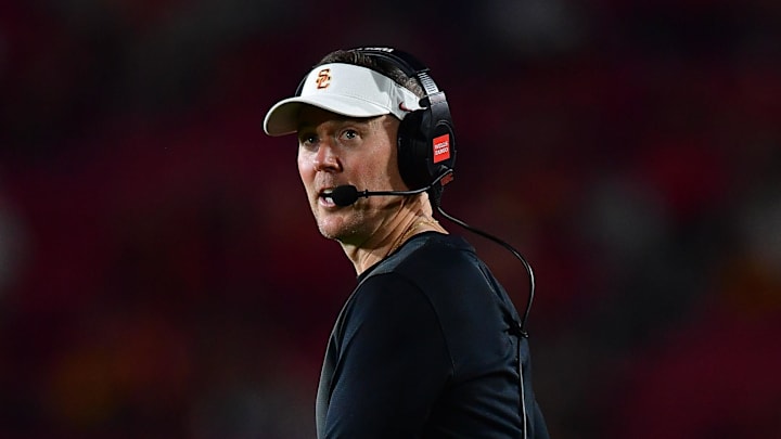 Sep 20, 2025; Los Angeles, California, USA; Southern California Trojans head coach Lincoln Riley watches game action against the Michigan State Spartans during the second half at the Los Angeles Memorial Coliseum. Mandatory Credit: Gary A. Vasquez-Imagn Images Sep 20, 2025; Los Angeles, California, USA; Southern California Trojans head coach Lincoln Riley watches game action against the Michigan State Spartans during the second half at the Los Angeles Memorial Coliseum. Mandatory Credit: Gary A. Vasquez-Imagn Images