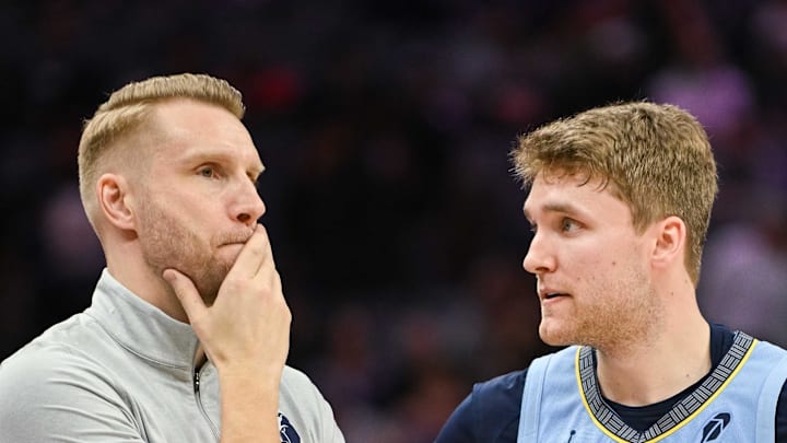 Feb 4, 2026; Sacramento, California, USA; Memphis Grizzlies head coach Tuomas Iisalo and guard Cam Spencer (24) talk during a free throw in the fourth quarter against the Sacramento Kings at Golden 1 Center. Mandatory Credit: Ed Szczepanski-Imagn Images