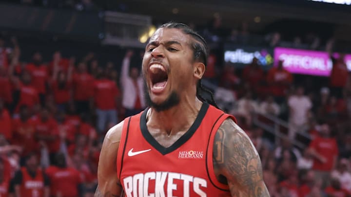 Apr 23, 2025; Houston, Texas, USA; Houston Rockets guard Jalen Green (4) reacts after scoring a basket during the third quarter during game two of the first round for the 2024 NBA Playoffs against the Golden State Warriors at Toyota Center. Mandatory Credit: Troy Taormina-Imagn Images